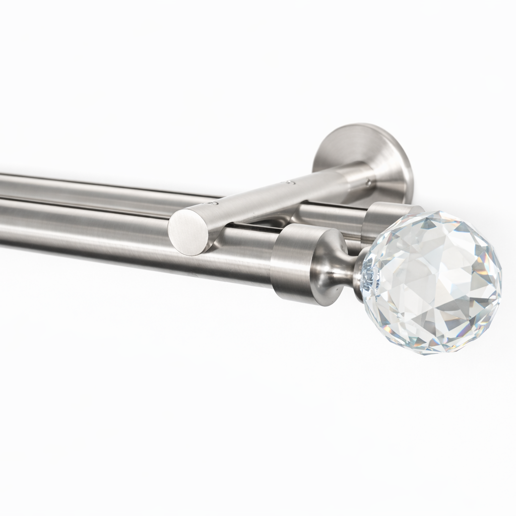 Curtain rod with crystal finial on a white background